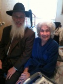 Rabbi Hecht making a bikur Cholim visit to Bea Bernstein